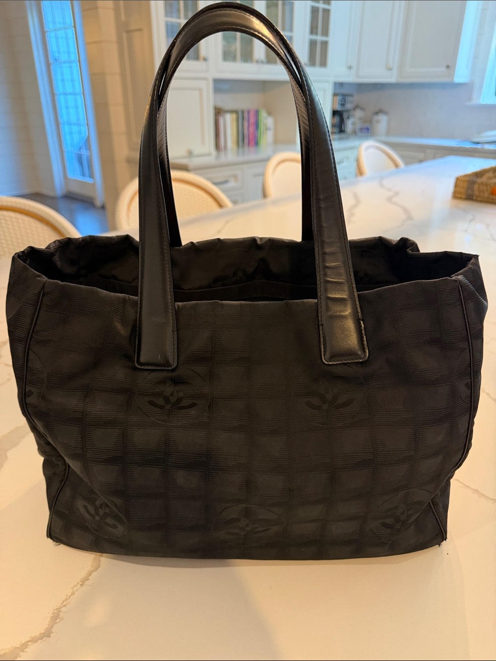 Authentic Chanel Black tote handbag with interlocking CC design